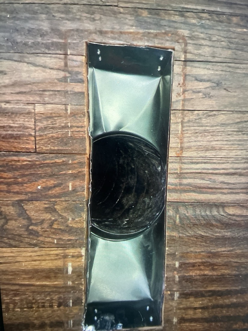 Shiny metal wall-mounted air return register