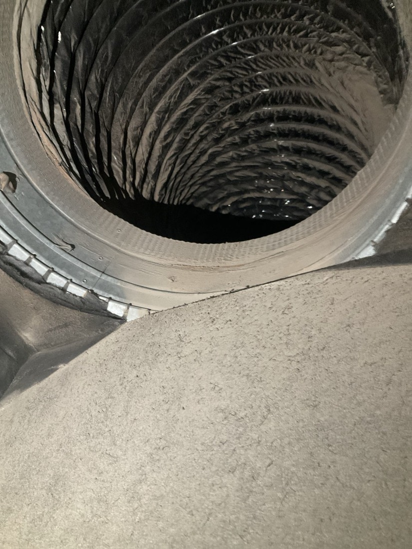 Clean blower wheel with visible internal components after duct cleaning.