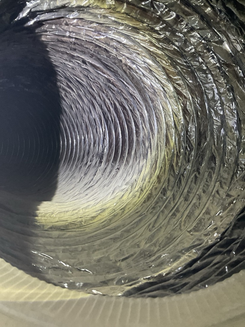 Clean interior view of metal ductwork during air duct cleaning