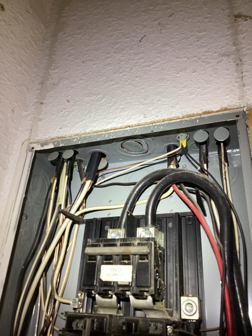 Sub-panel with circuit breakers and wire connections installed