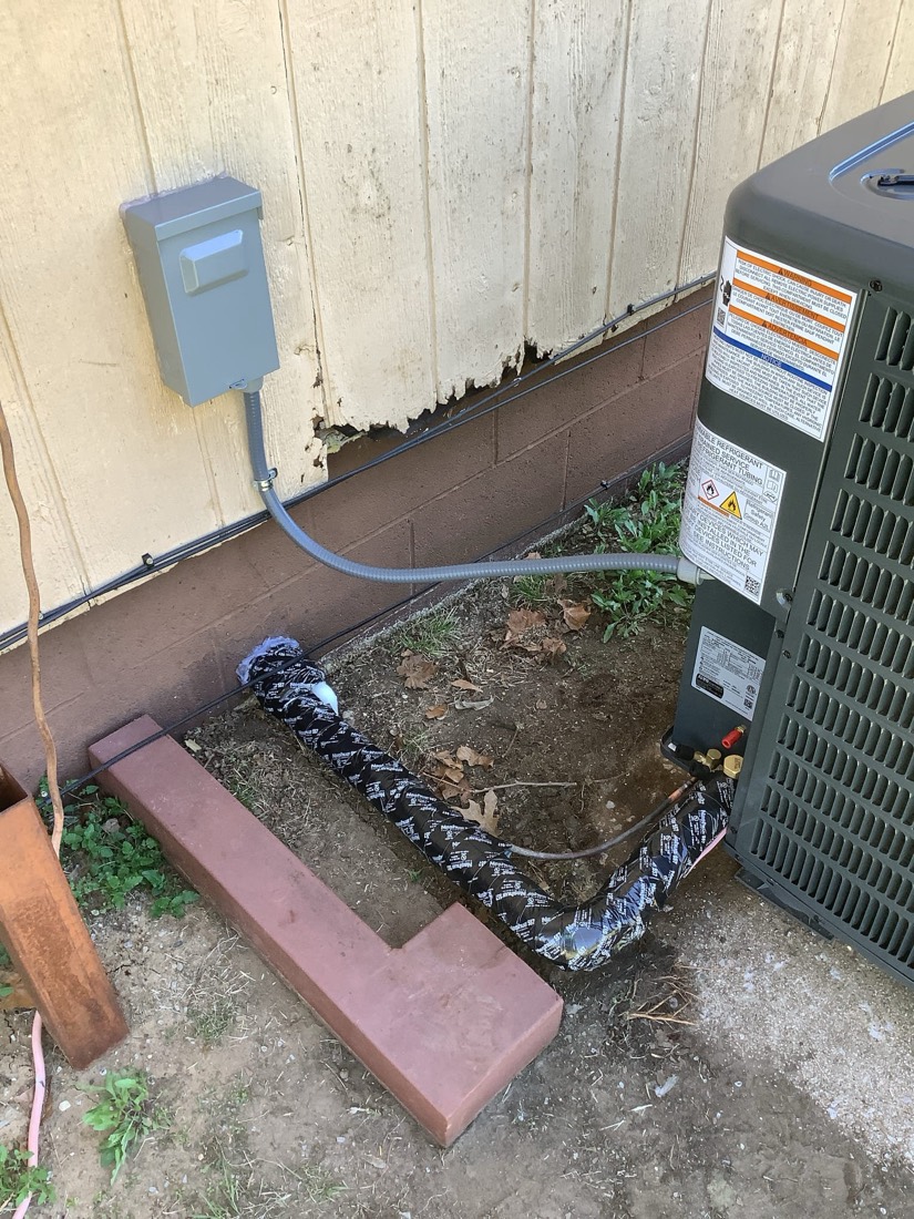 Outdoor HVAC system with disconnect switch and line set