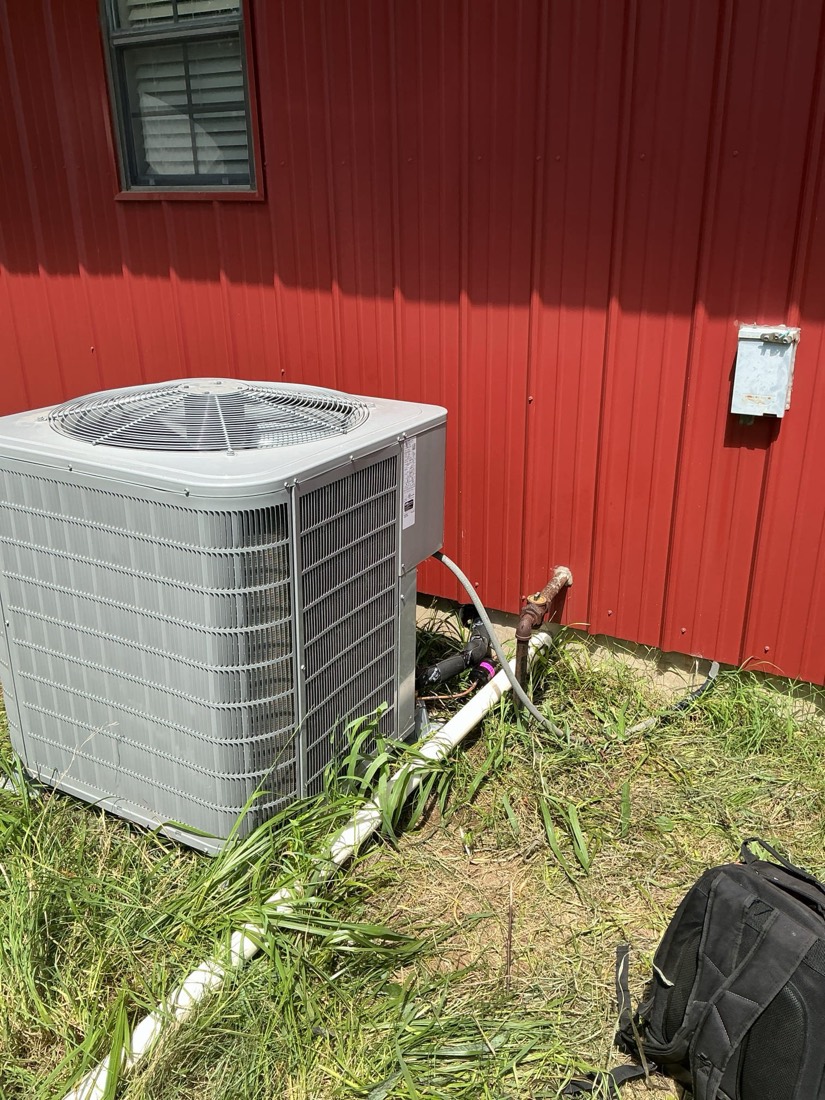 AC condenser unit installed at home.