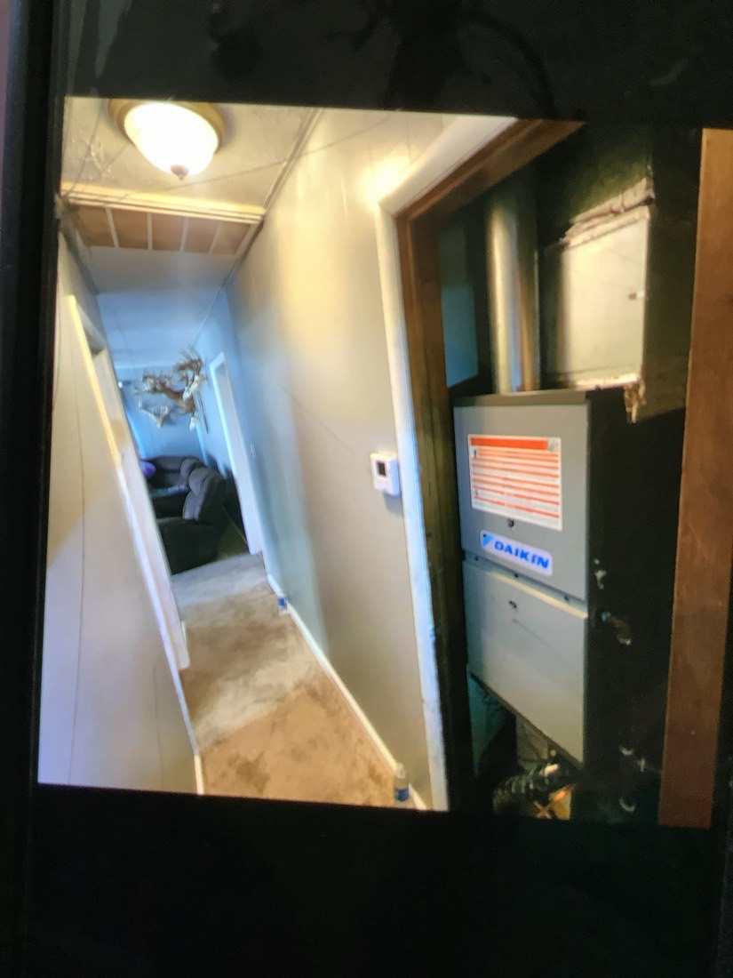 Newly installed Daikin air handler in home basement.