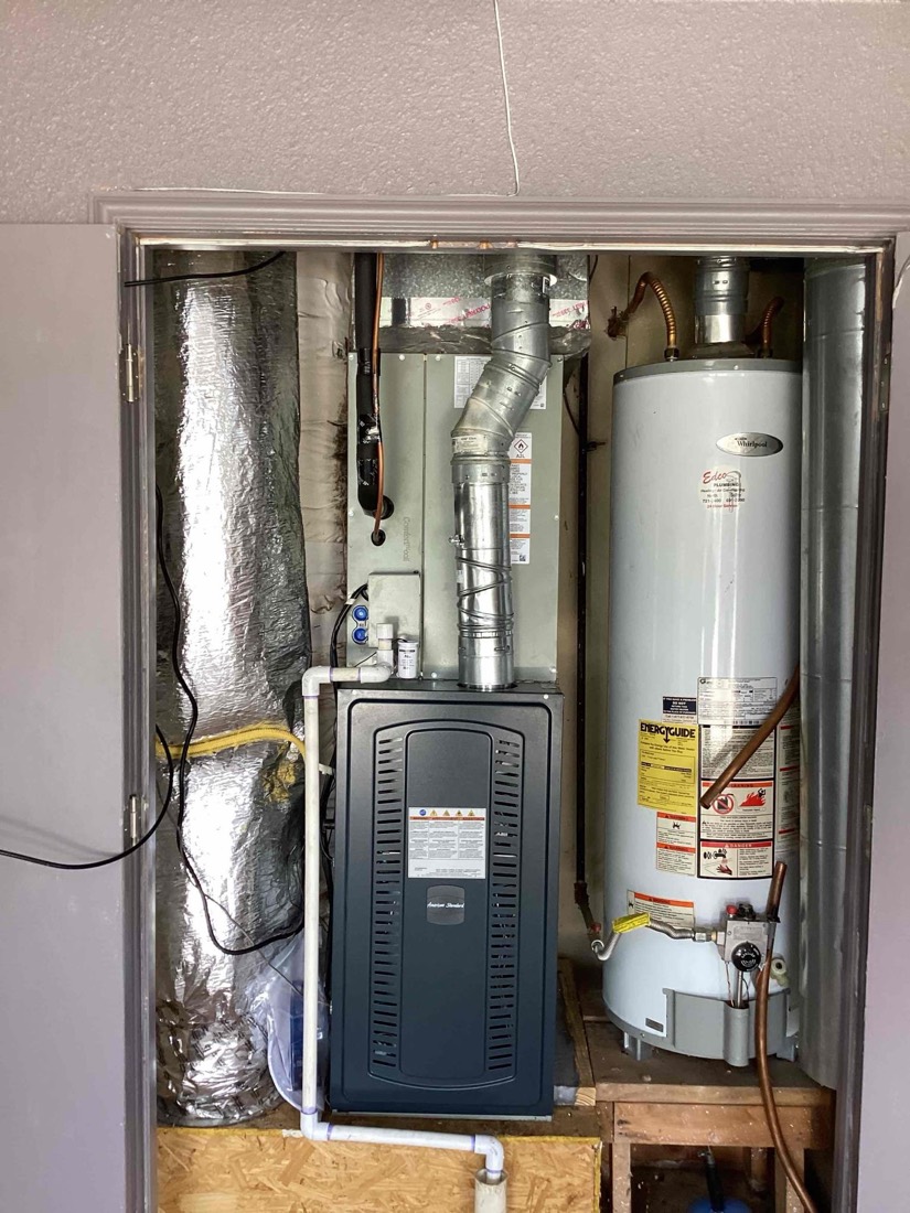 Installed furnace and water heater with insulated ductwork
