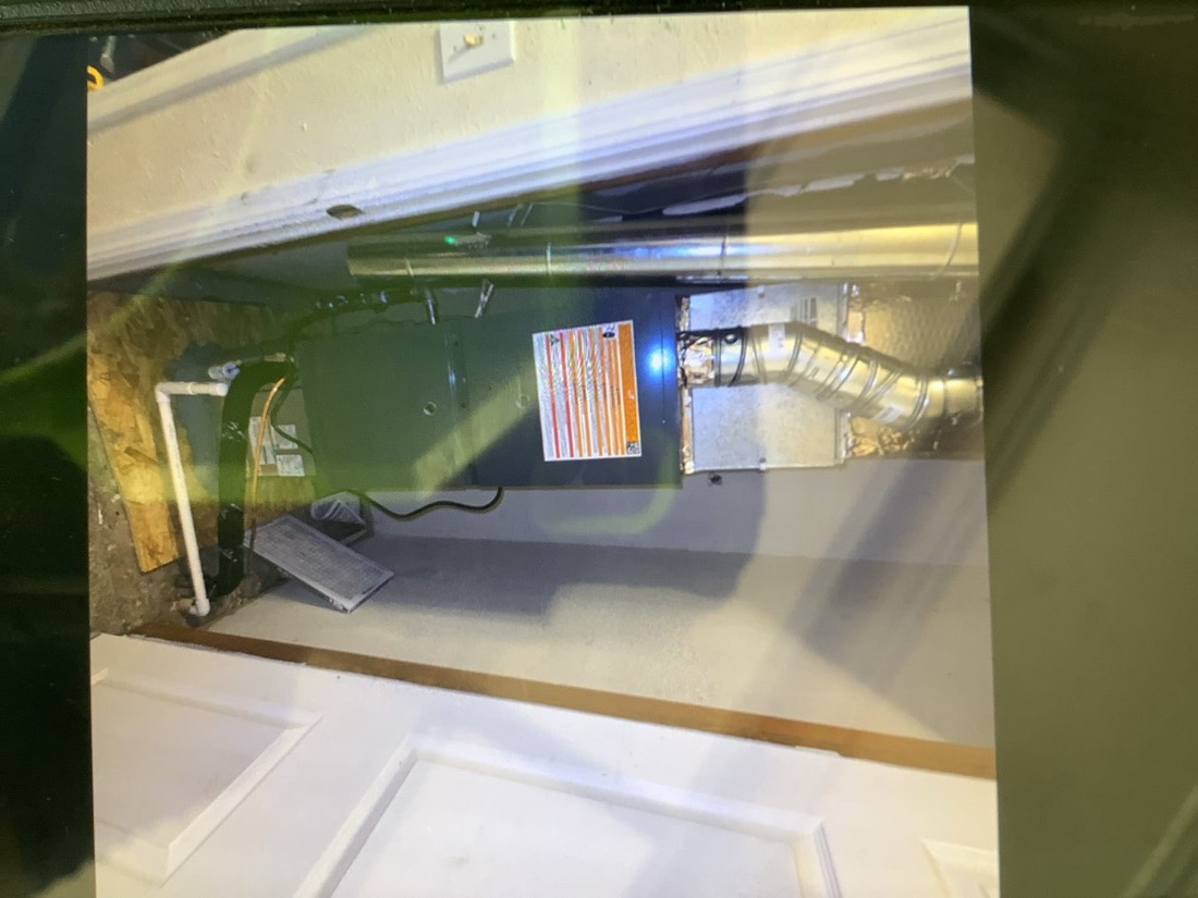 Furnace installation with connected ducts and wiring