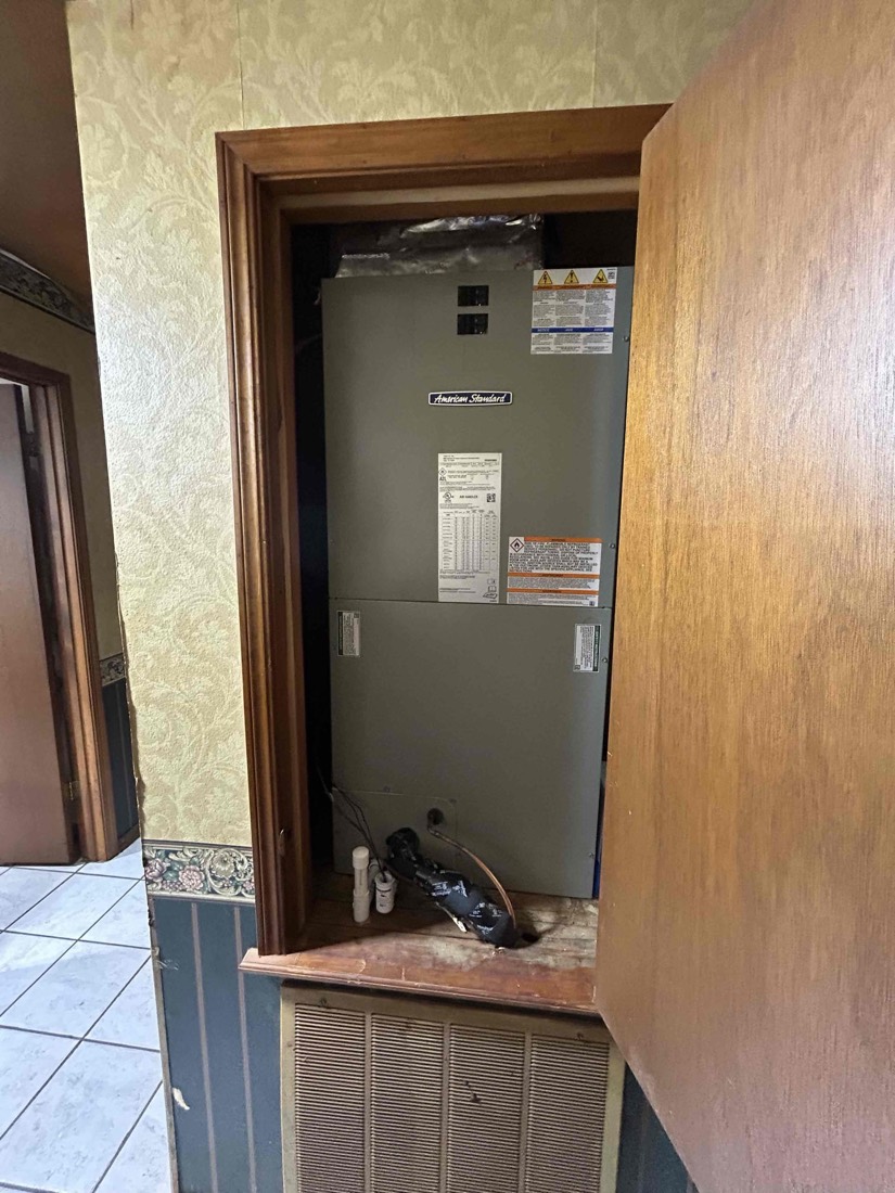 American Standard air handler installed in home closet.