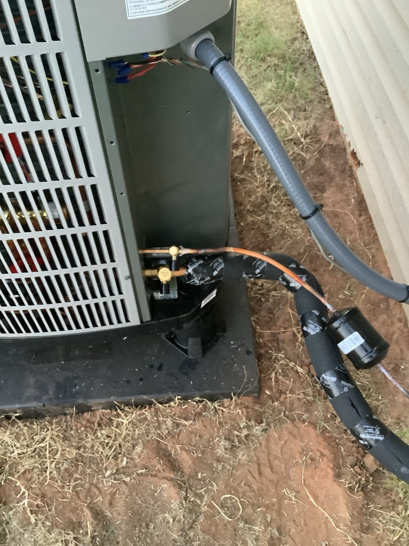 AC unit refrigerant lines and electrical connections
