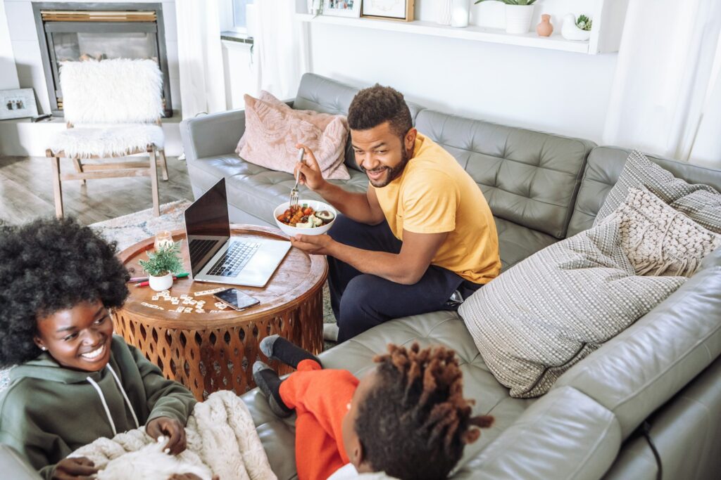 family in home living room